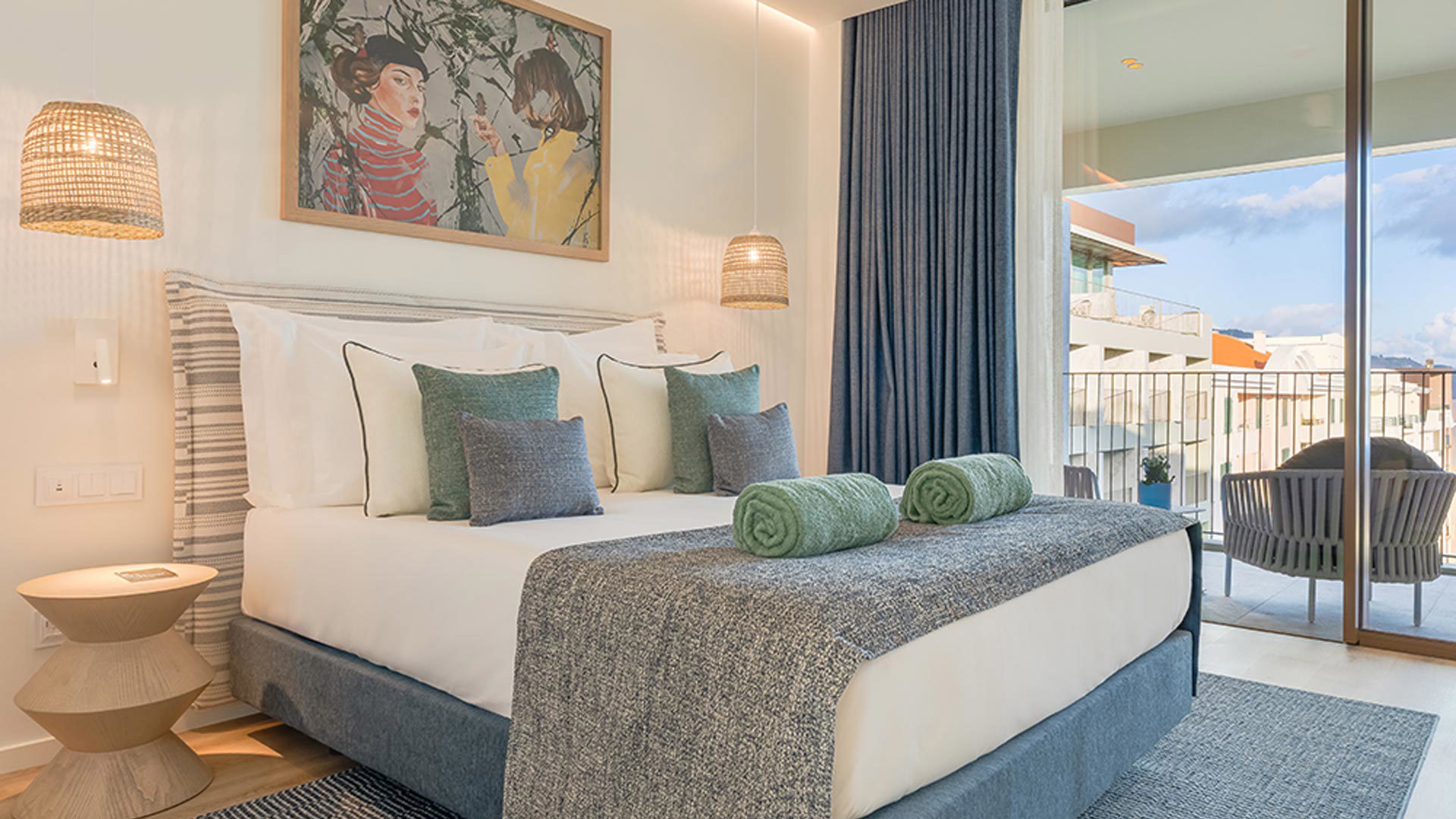 Double bed in a room at The Editory Ocean Way Funchal on Madeira Island.