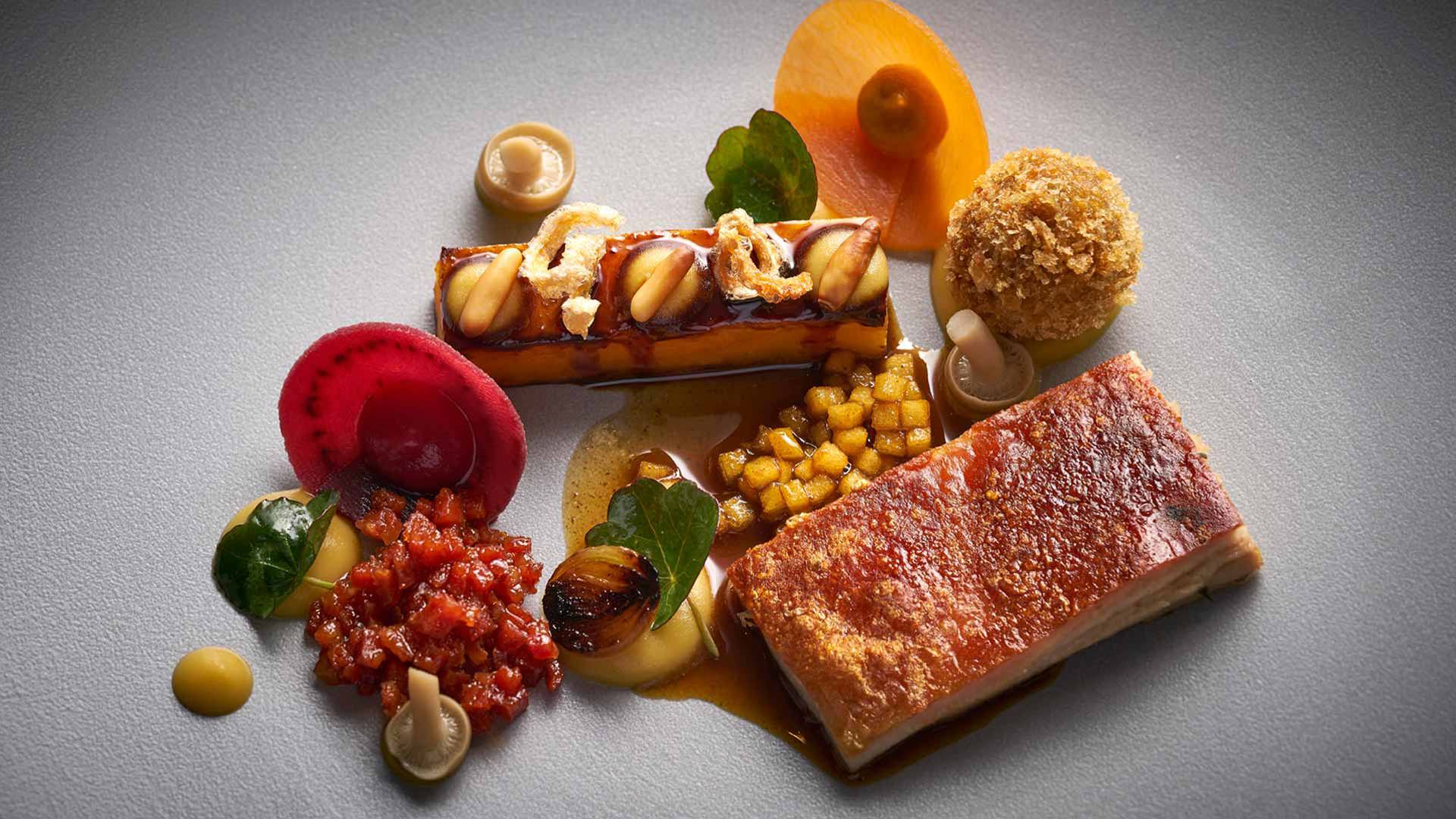 Plate with a plated meal in contemporary cuisine style.